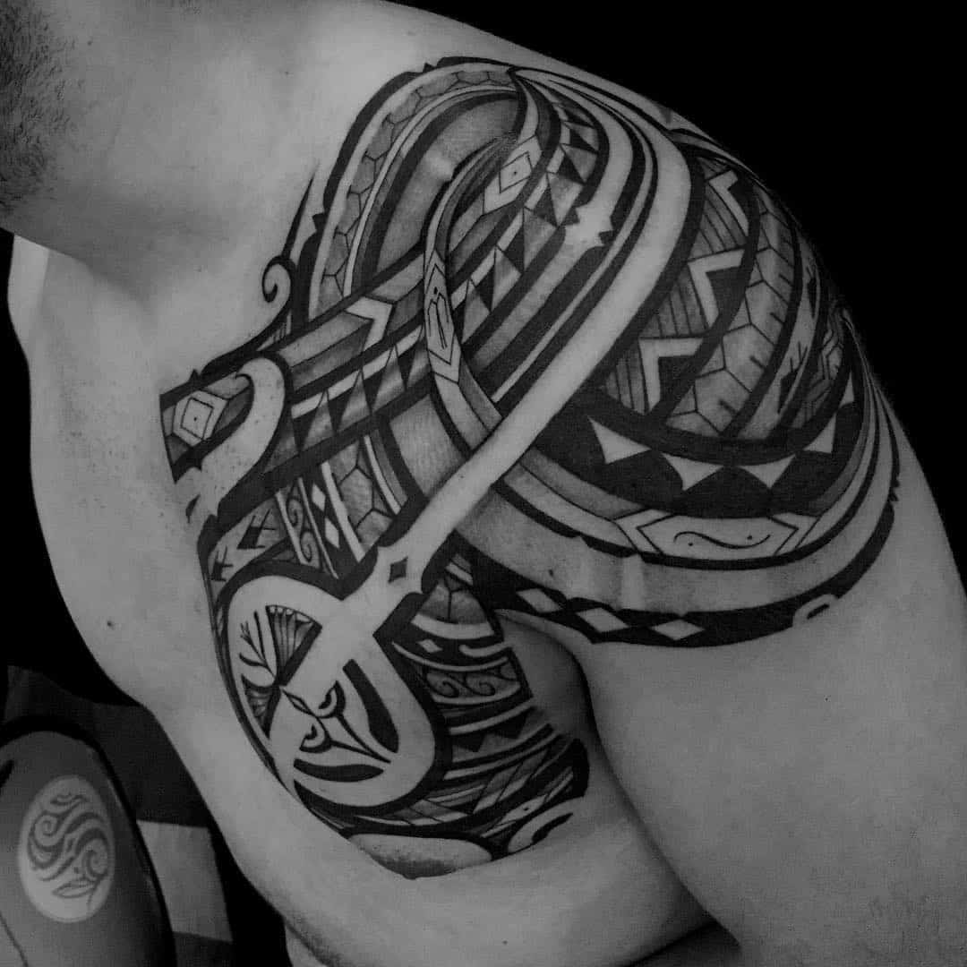 tribal egyptian tattoo on arm