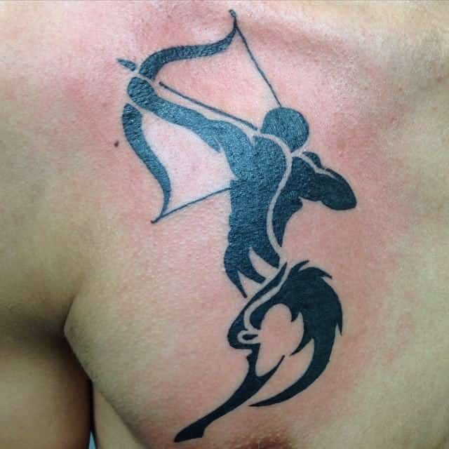 tribal sagittarius tattoo on chest