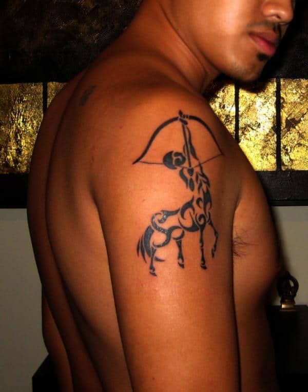 tribal sagittarius tattoo on arm