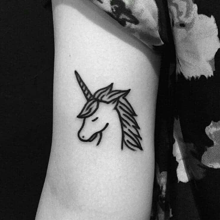 unicorn tattoo on arm