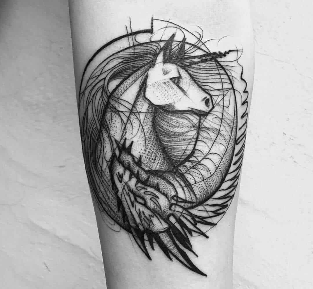 unicorn arm tattoo