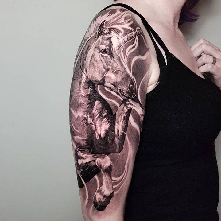 unicorn arm tattoo