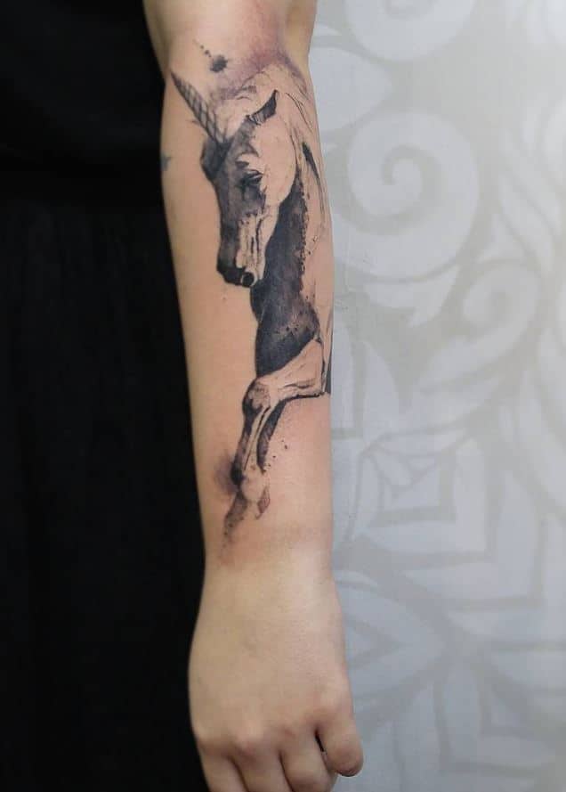 unicorn arm tattoo