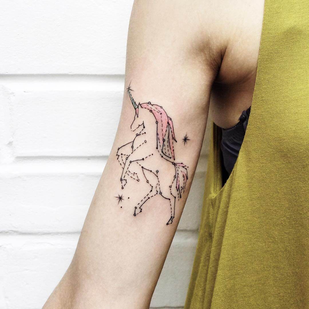 unicorn tattoo on arm