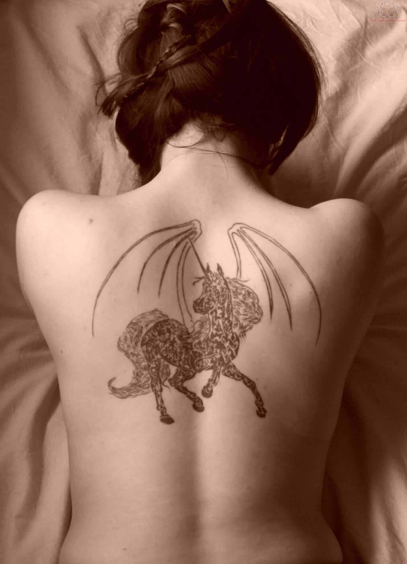 unicorn tattoo on back