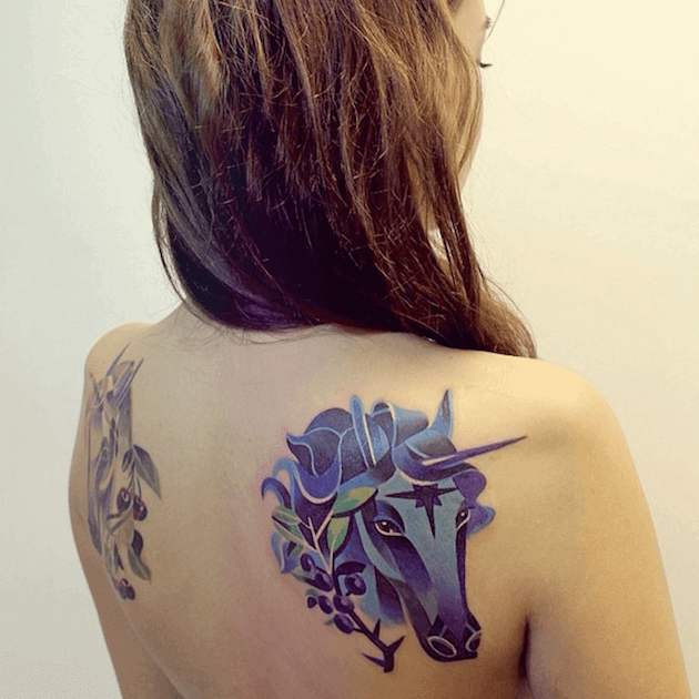 unicorn back tattoo