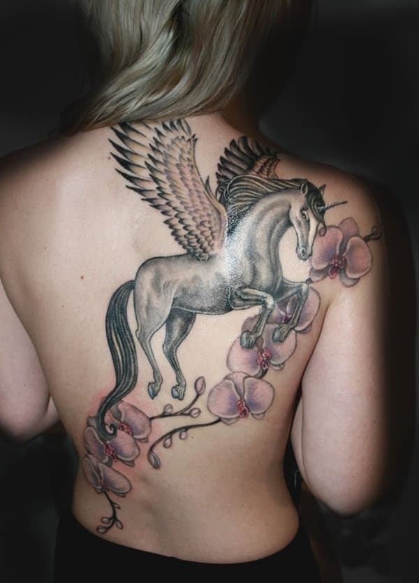unicorn tattoo on back