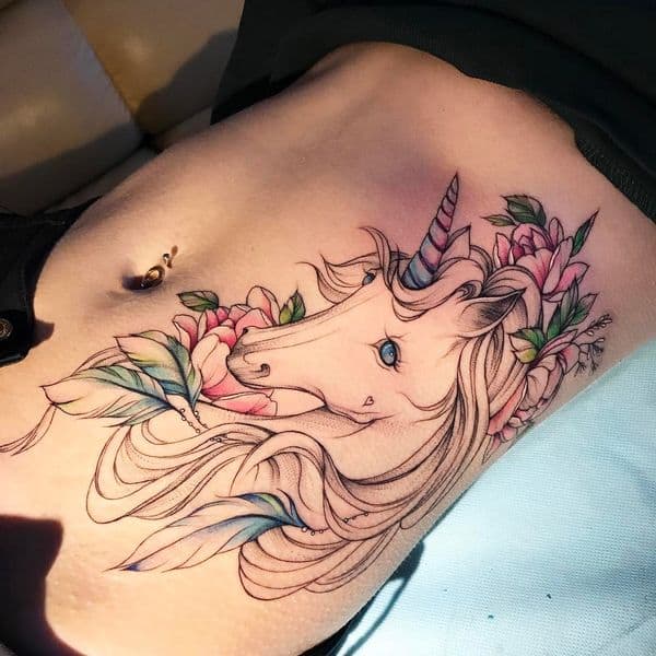 unicorn rib tattoo