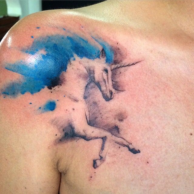 unicorn shoulder tattoo