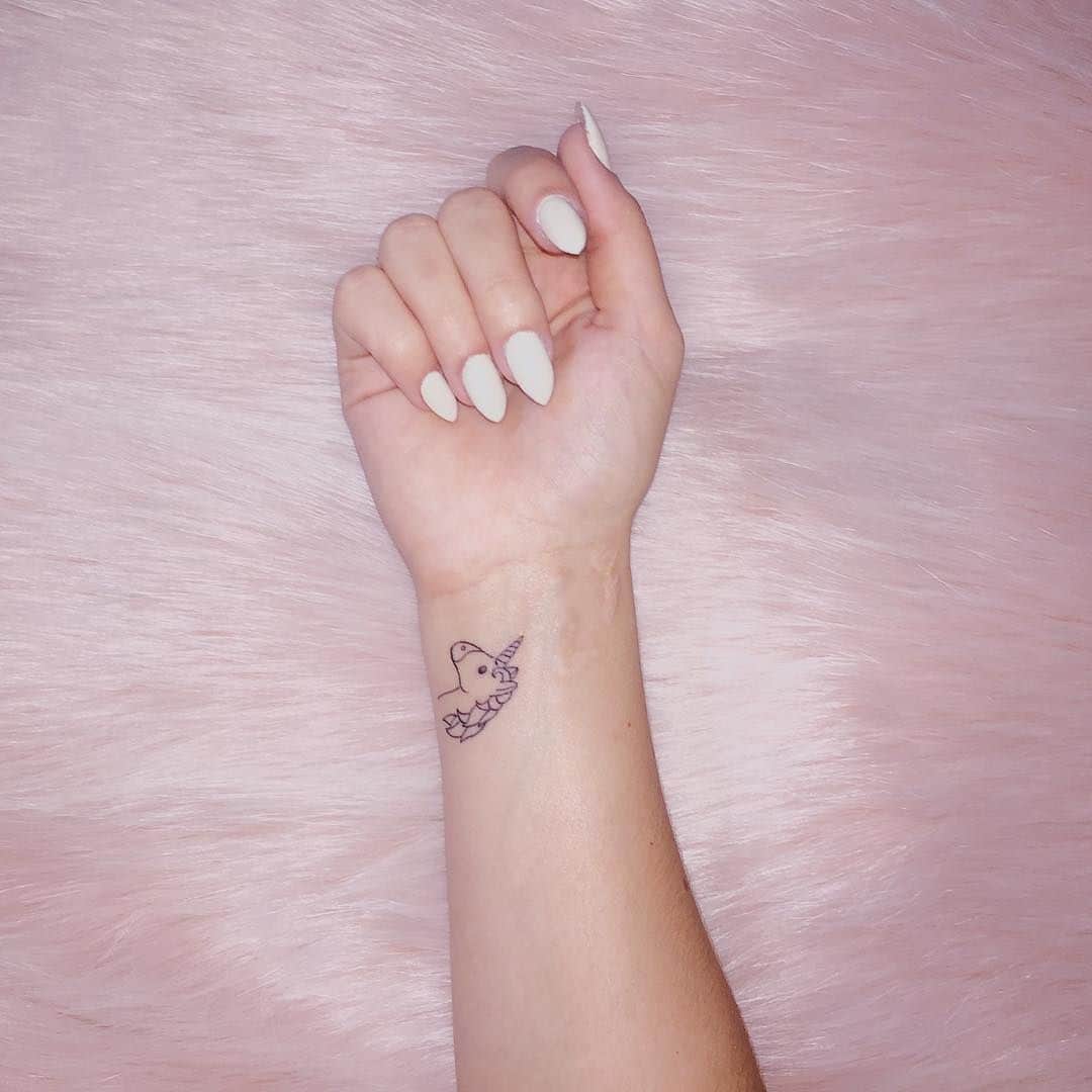 unicorn tattoo on wrist