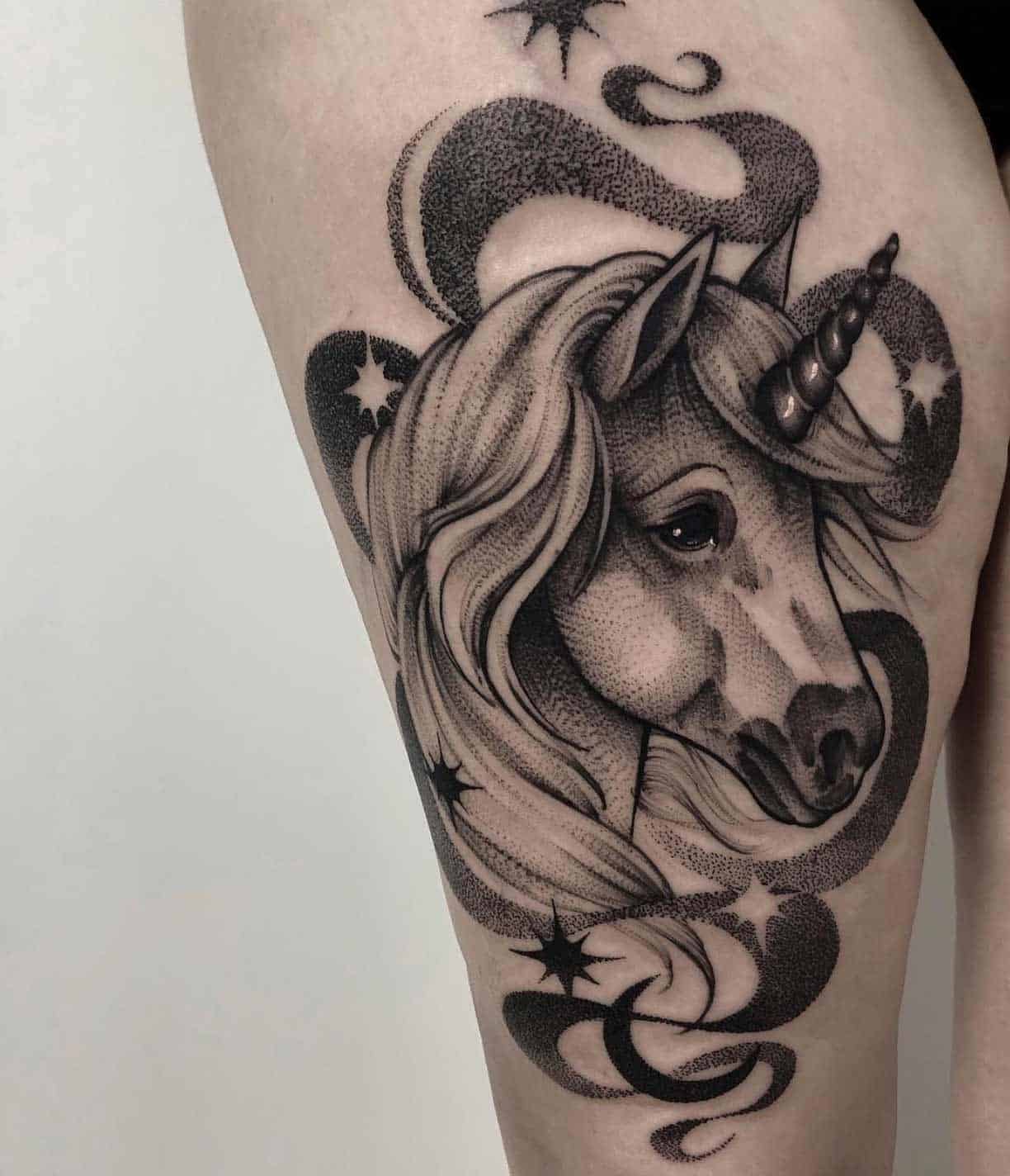 unicorn thigh tattoo