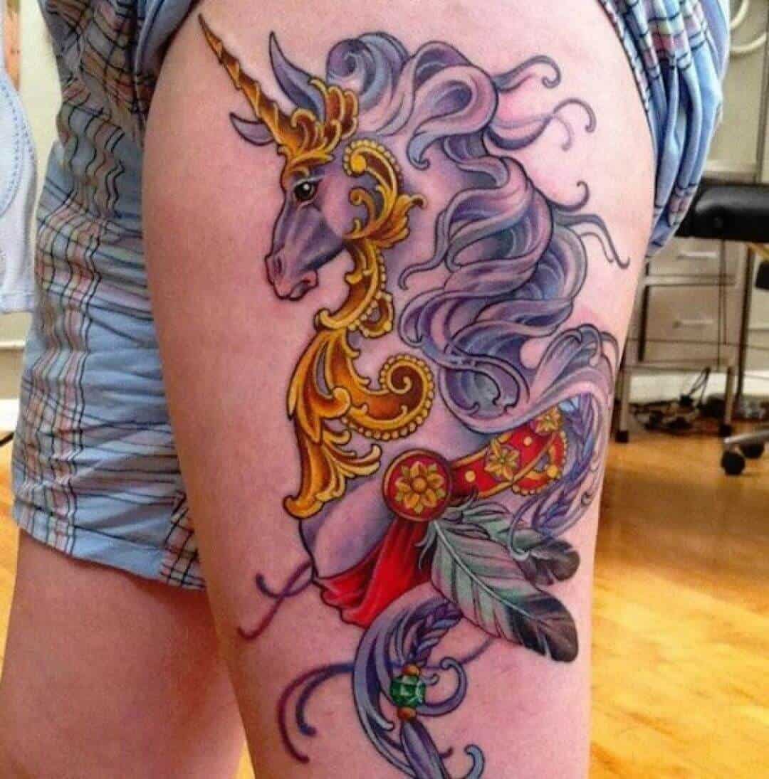 unicorn tattoo on thigh