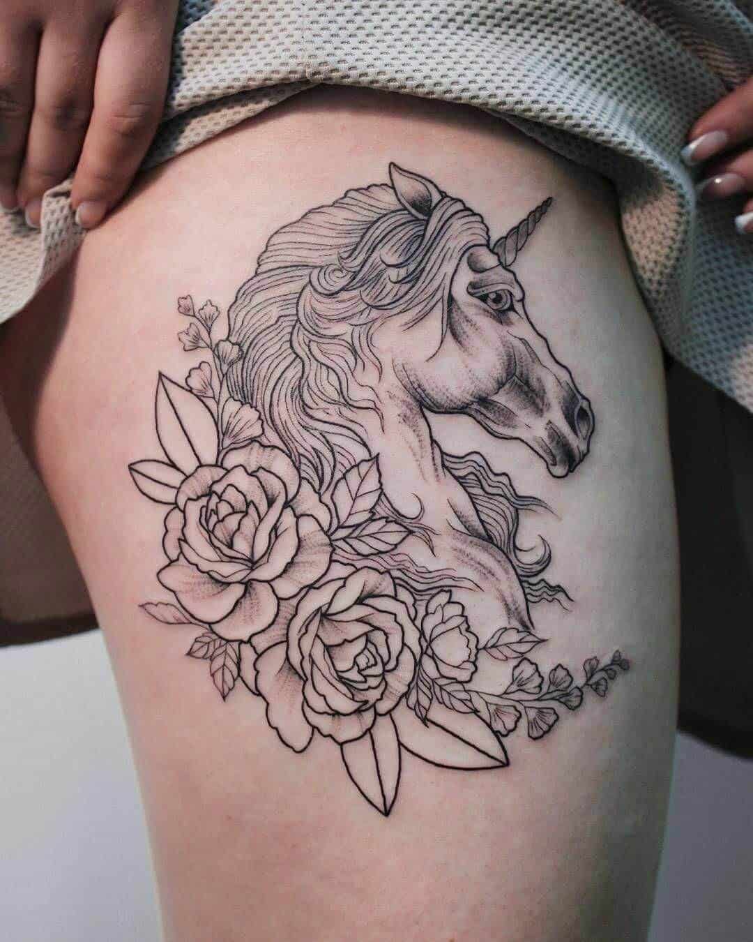 unicorn thigh tattoo