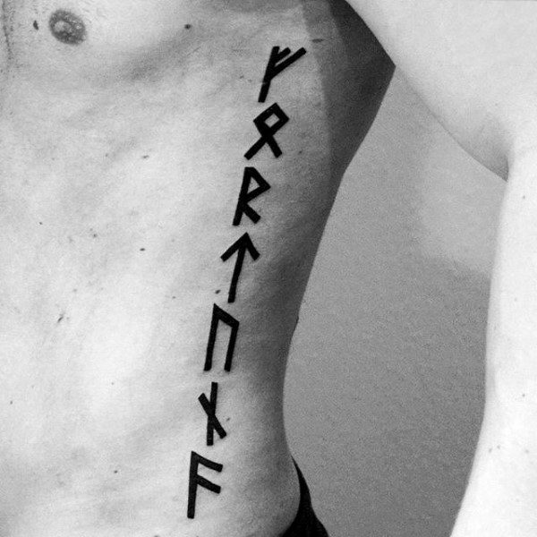 viking runes tattoo on rib