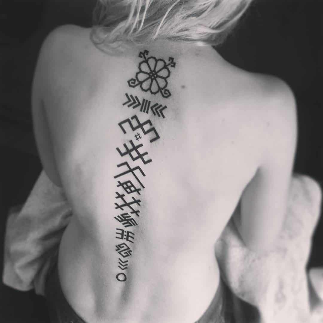 viking runes tattoo on back
