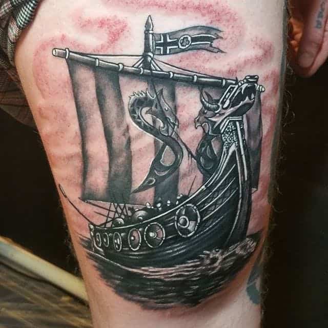 viking ship thigh tattoo