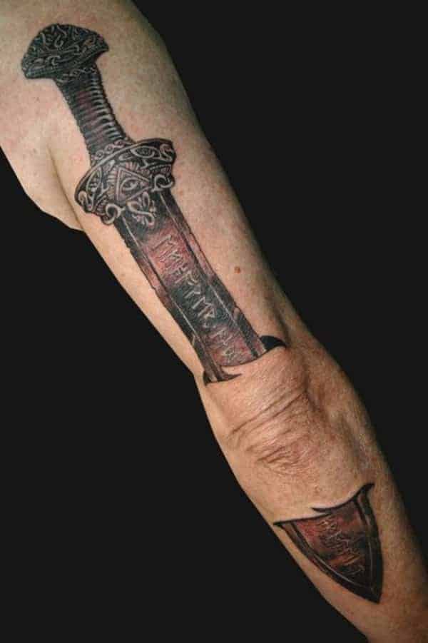 viking sword tattoo on arm