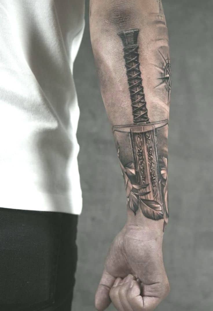 viking sword tattoo on arm