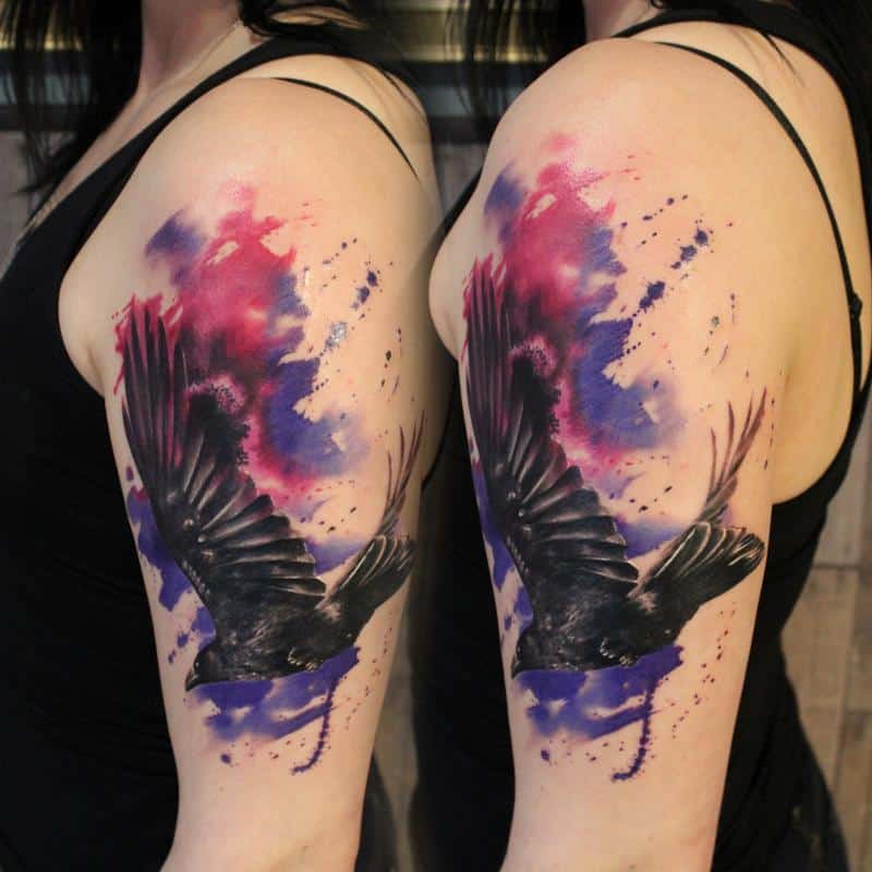 watercolor crow raven tattoo on arm