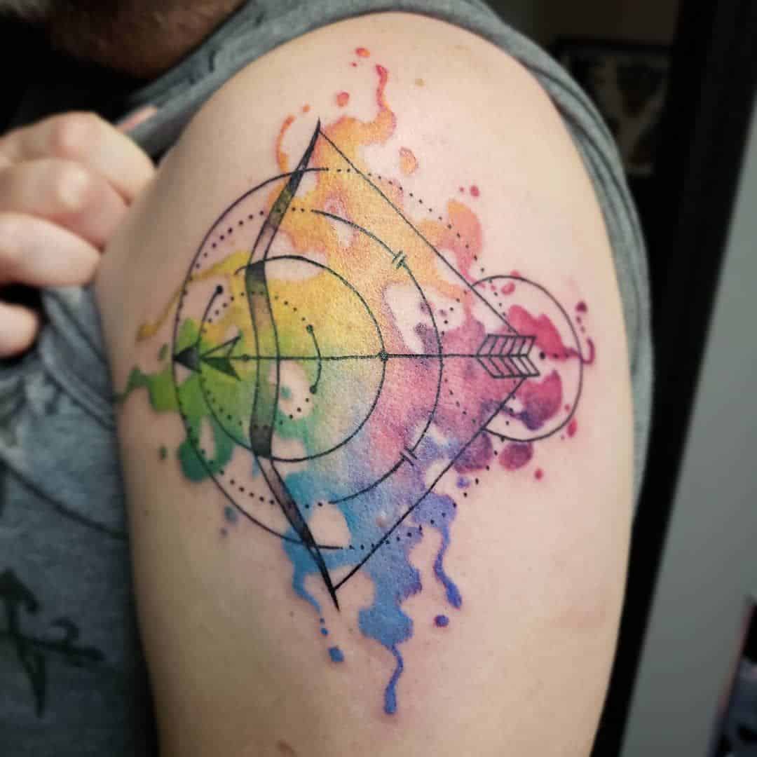 watercolor sagittarius tattoo on arm