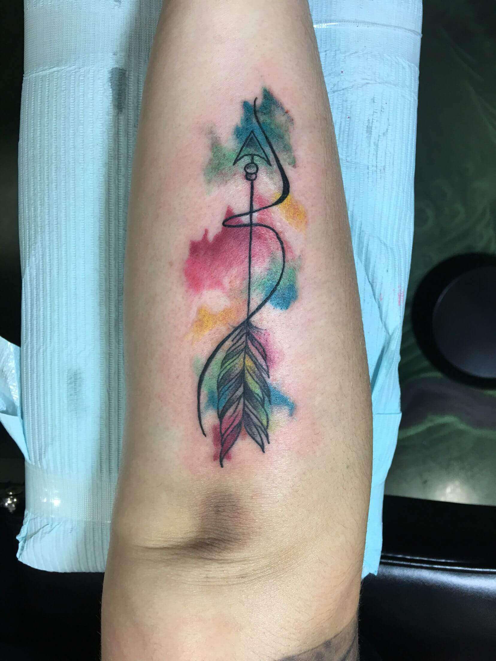 watercolor sagittarius tattoo on arm