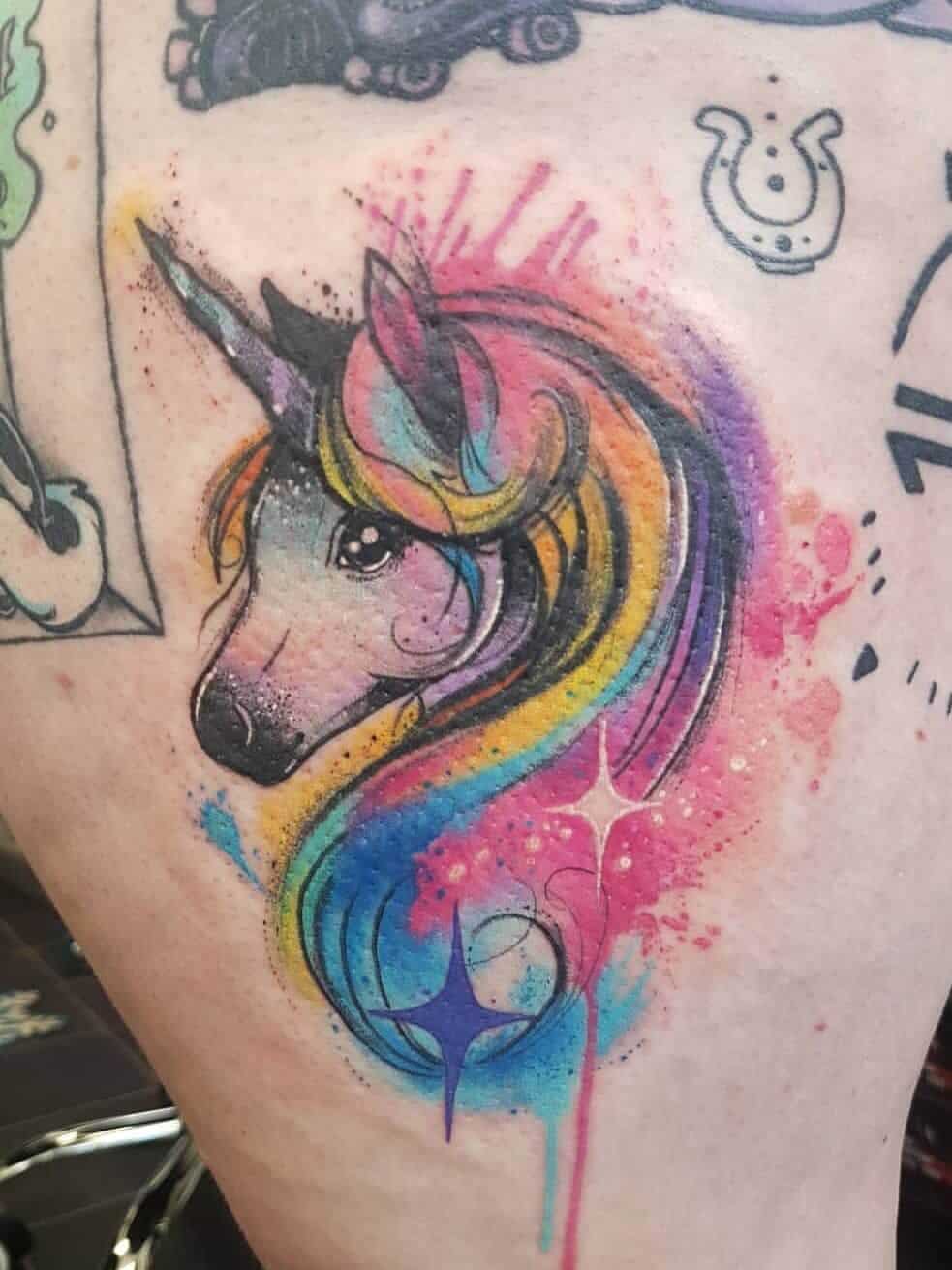 watercolor unicorn tattoo