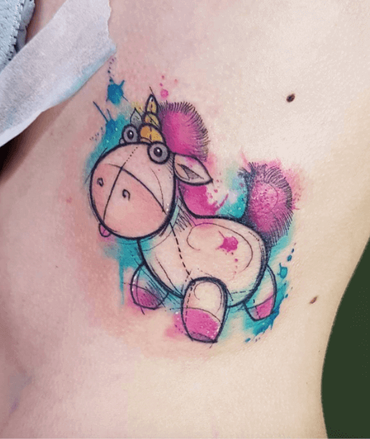 watercolor unicorn tattoo