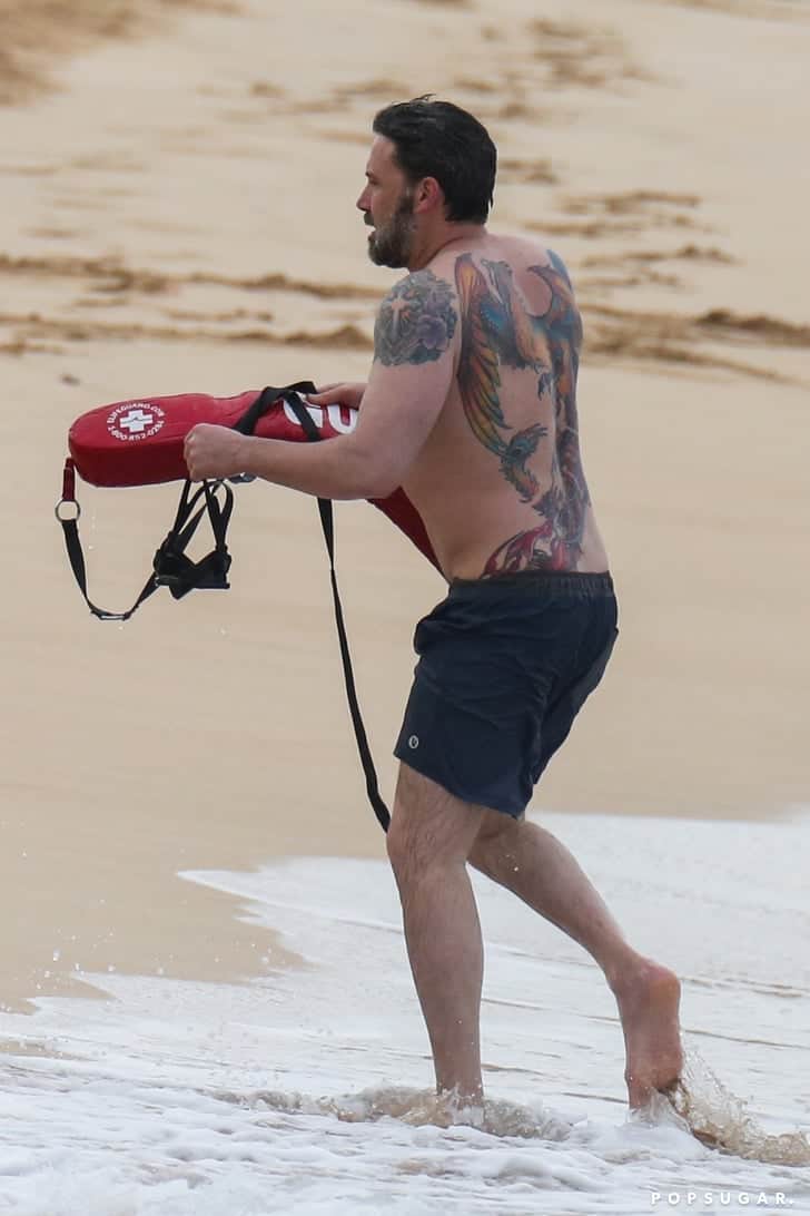 ben affleck cross and flowers tattoo