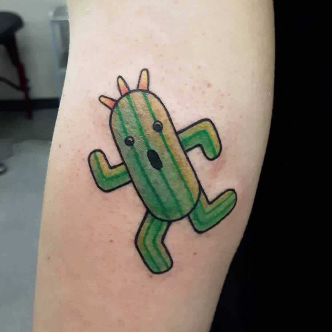 cactuar tattoo on arm