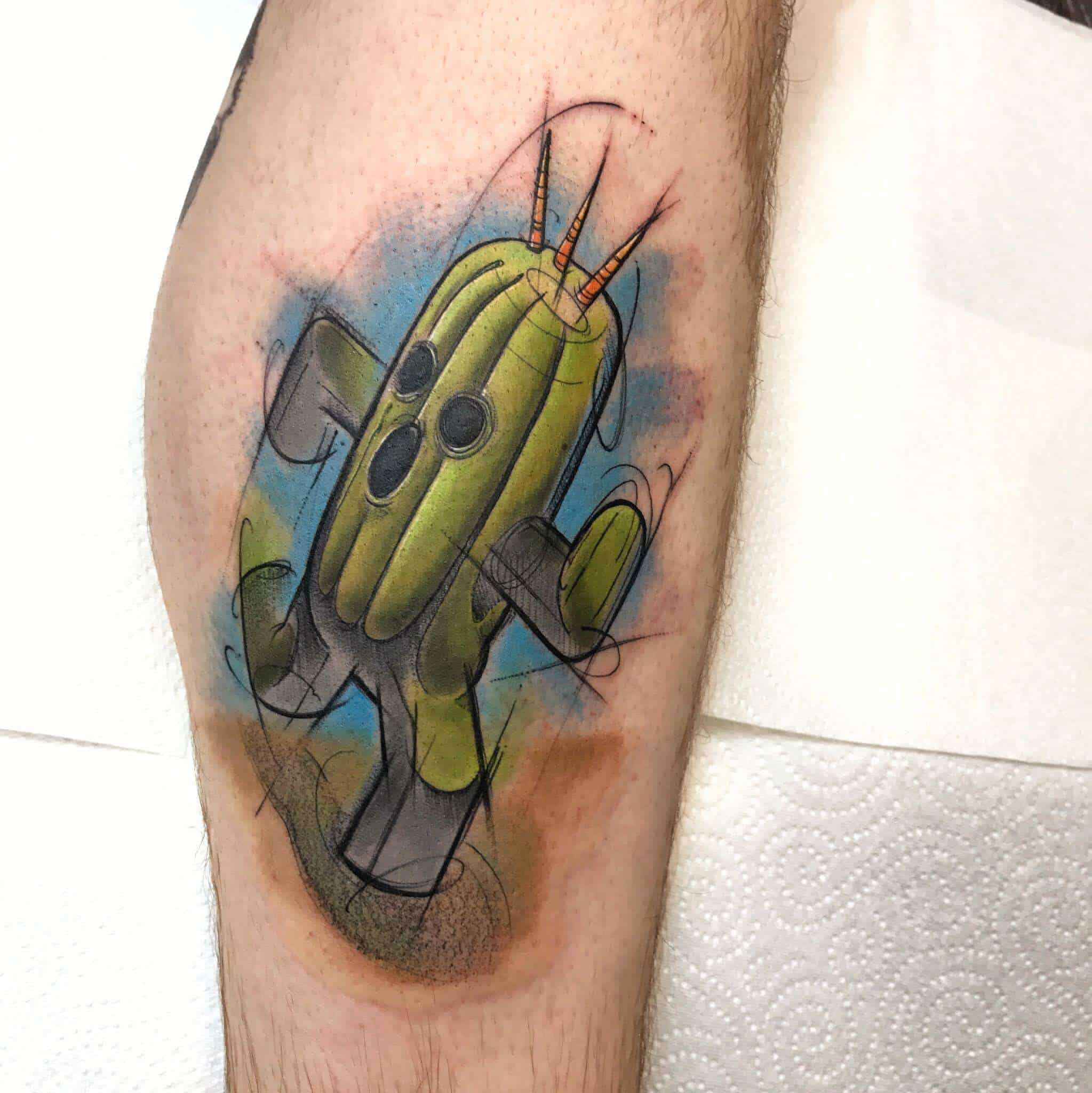 cactuar tattoo on leg