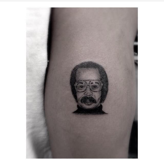 drake father's mugshot tattoo