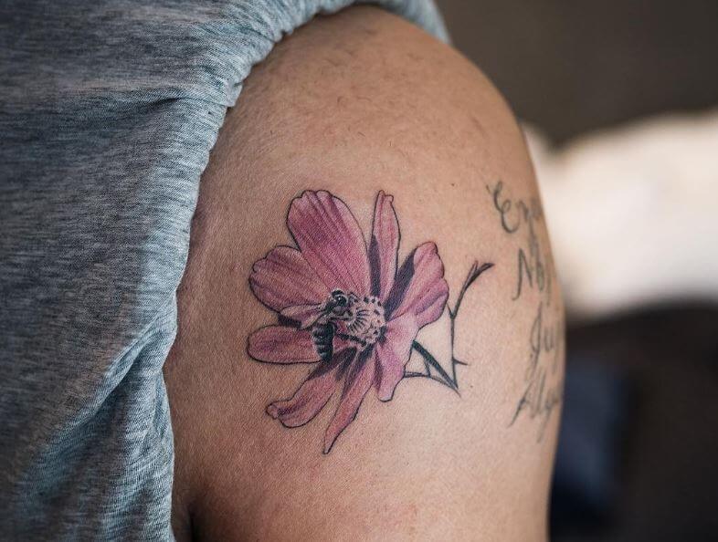 drake flower and bee tattoo