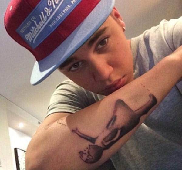 justin bieber banksy’s balloon girl tattoo