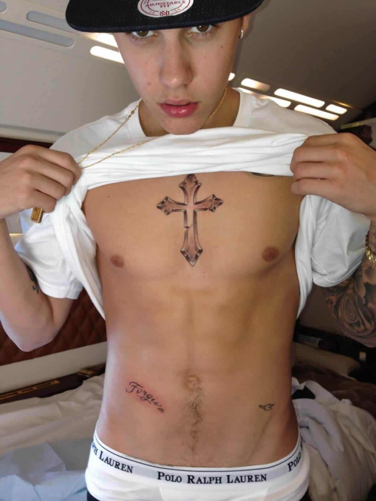 justin bieber forgive tattoo