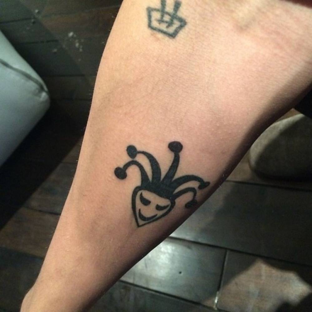 justin bieber jester tattoo