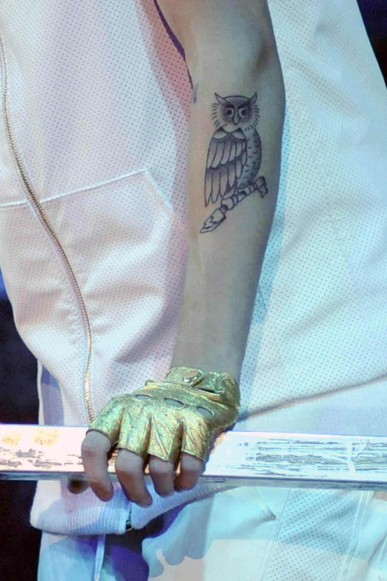 justin bieber owl tattoo