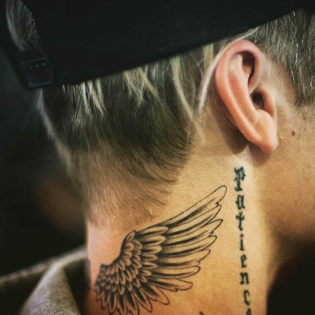 justin bieber wings tattoo