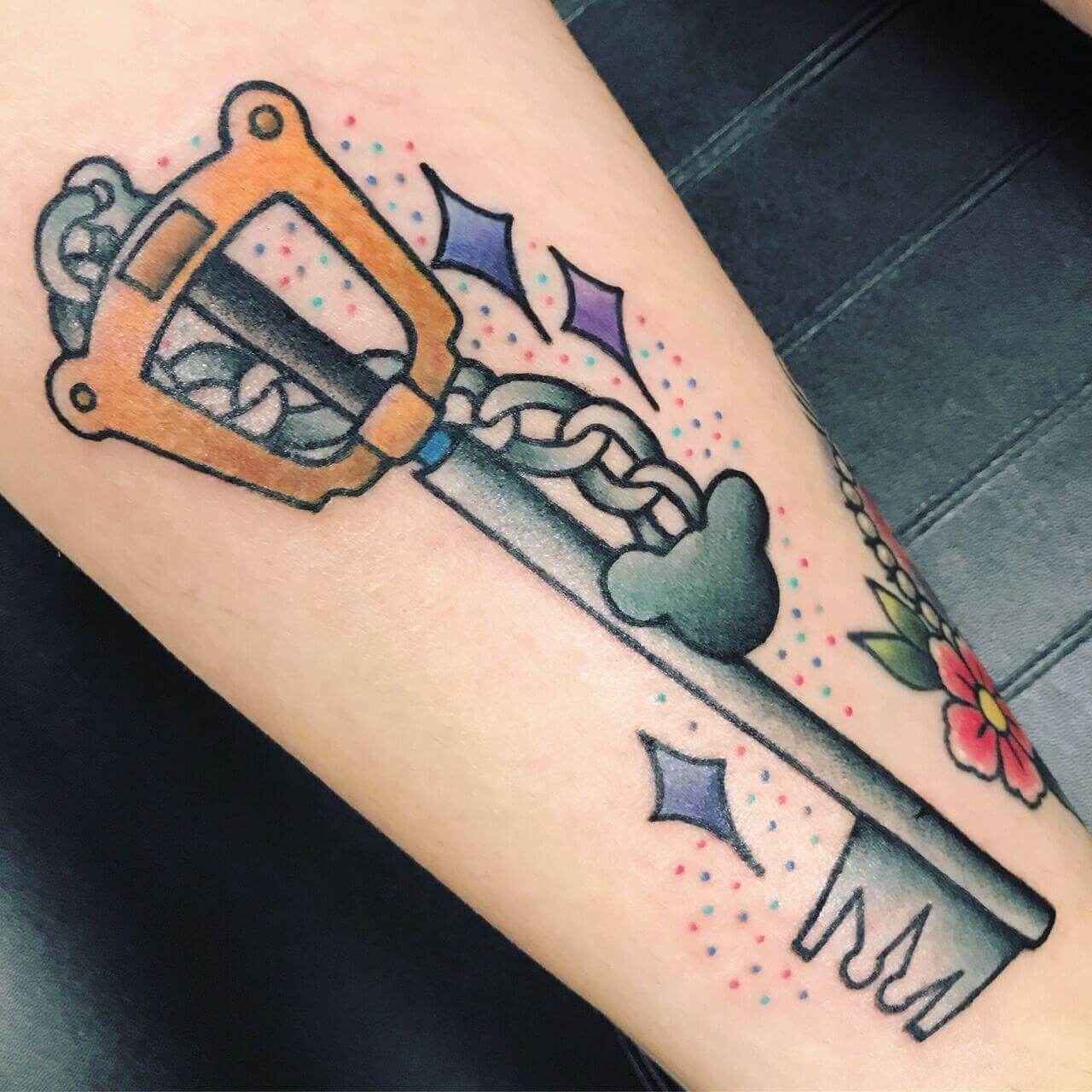 keyblade tattoo on arm