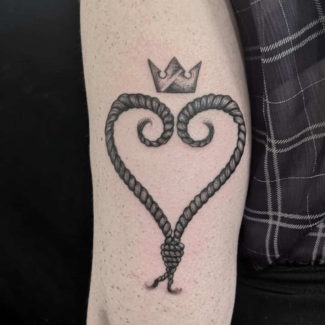kingdom hearts crown tattoo on arm