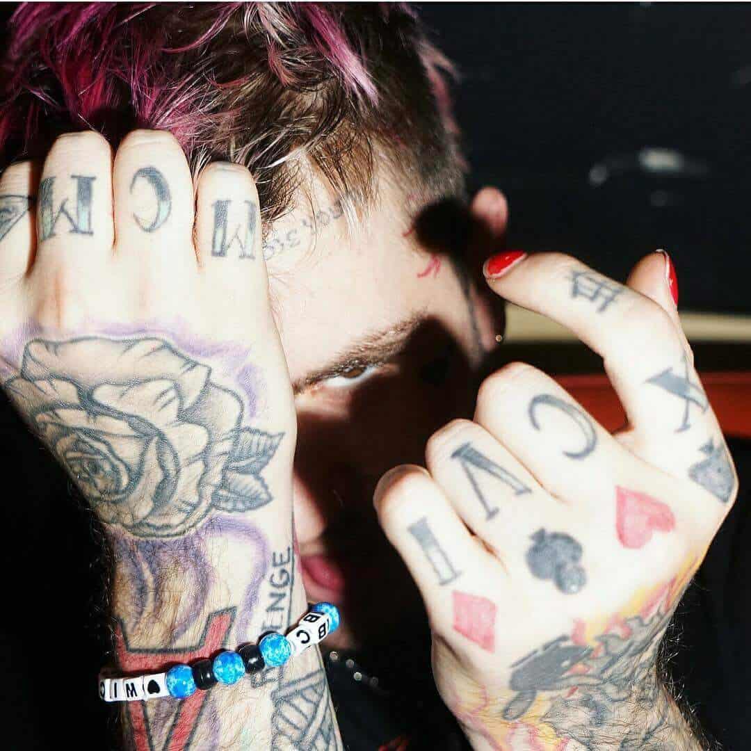 lil peep playboy sign tattoo