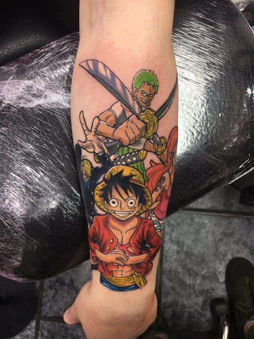 one piece arm tattoo