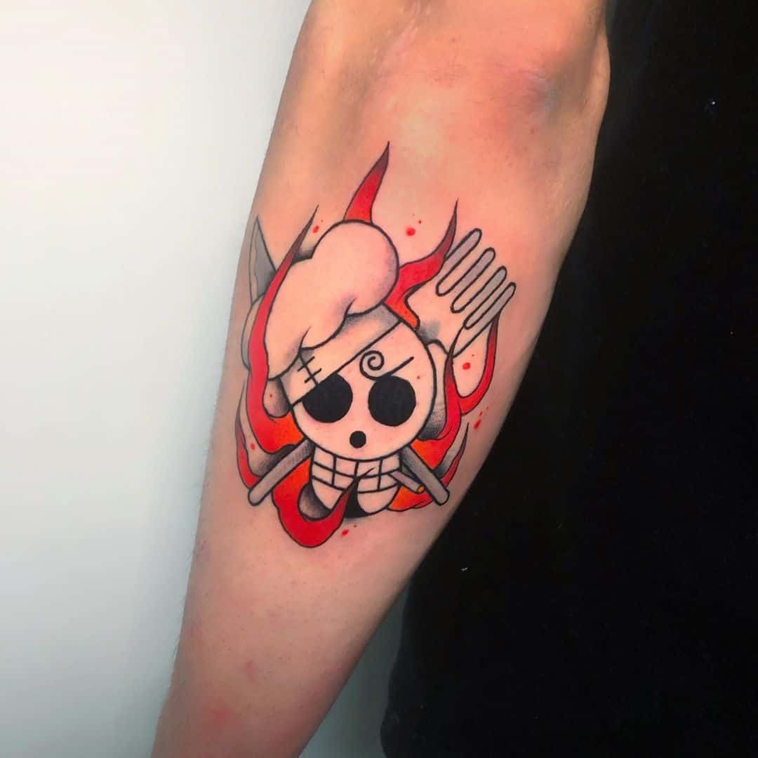 one piece skull tattoo on arm