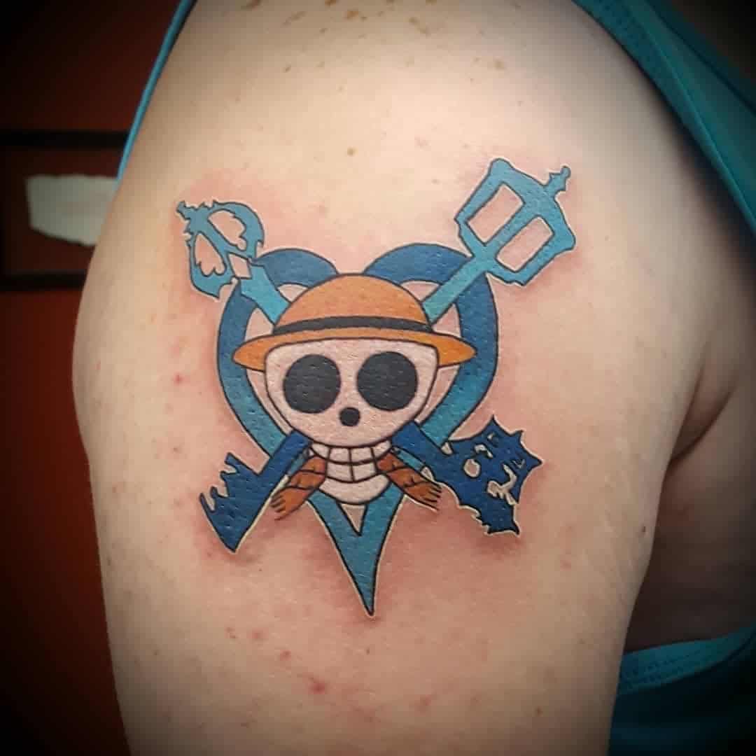 one piece skull tattoo on arm