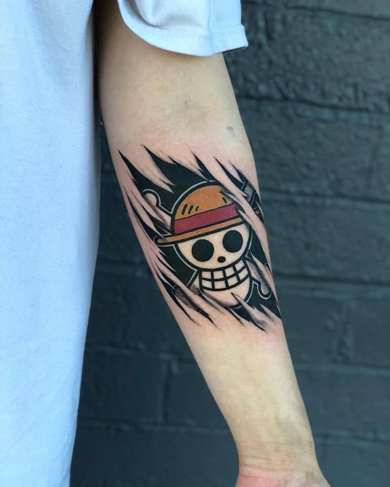 one piece skull arm tattoo