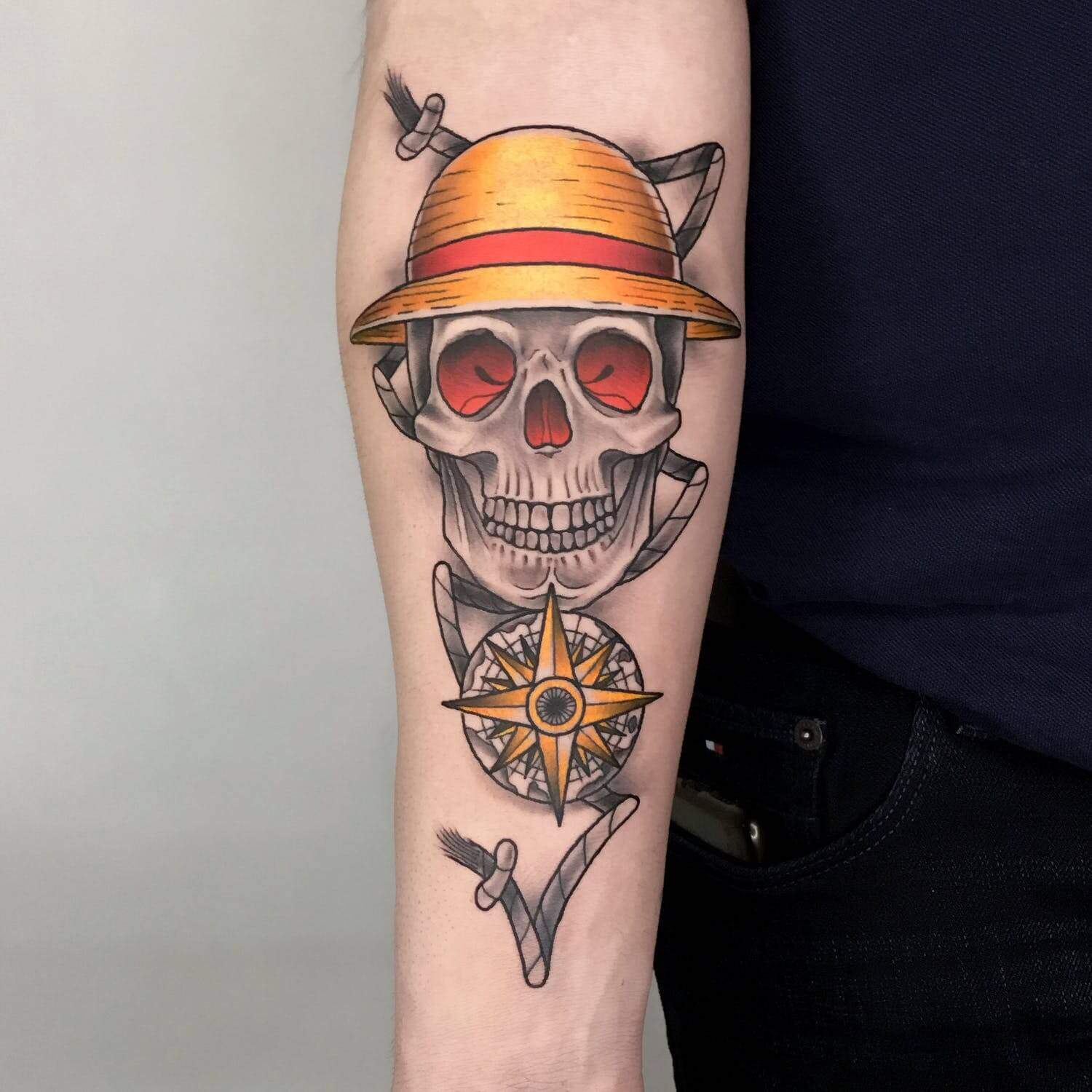 one piece skull arm tattoo