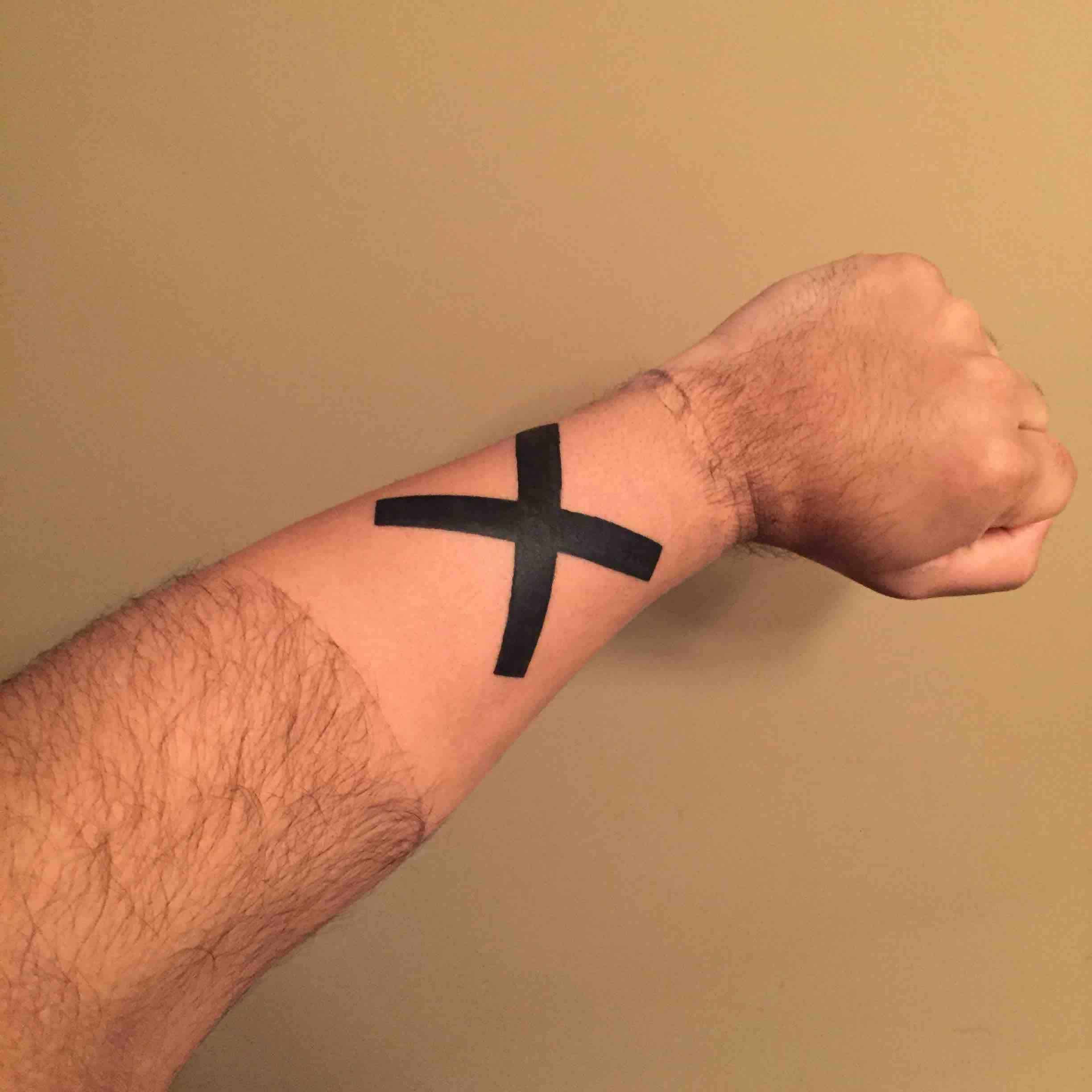 one piece x arm tattoo