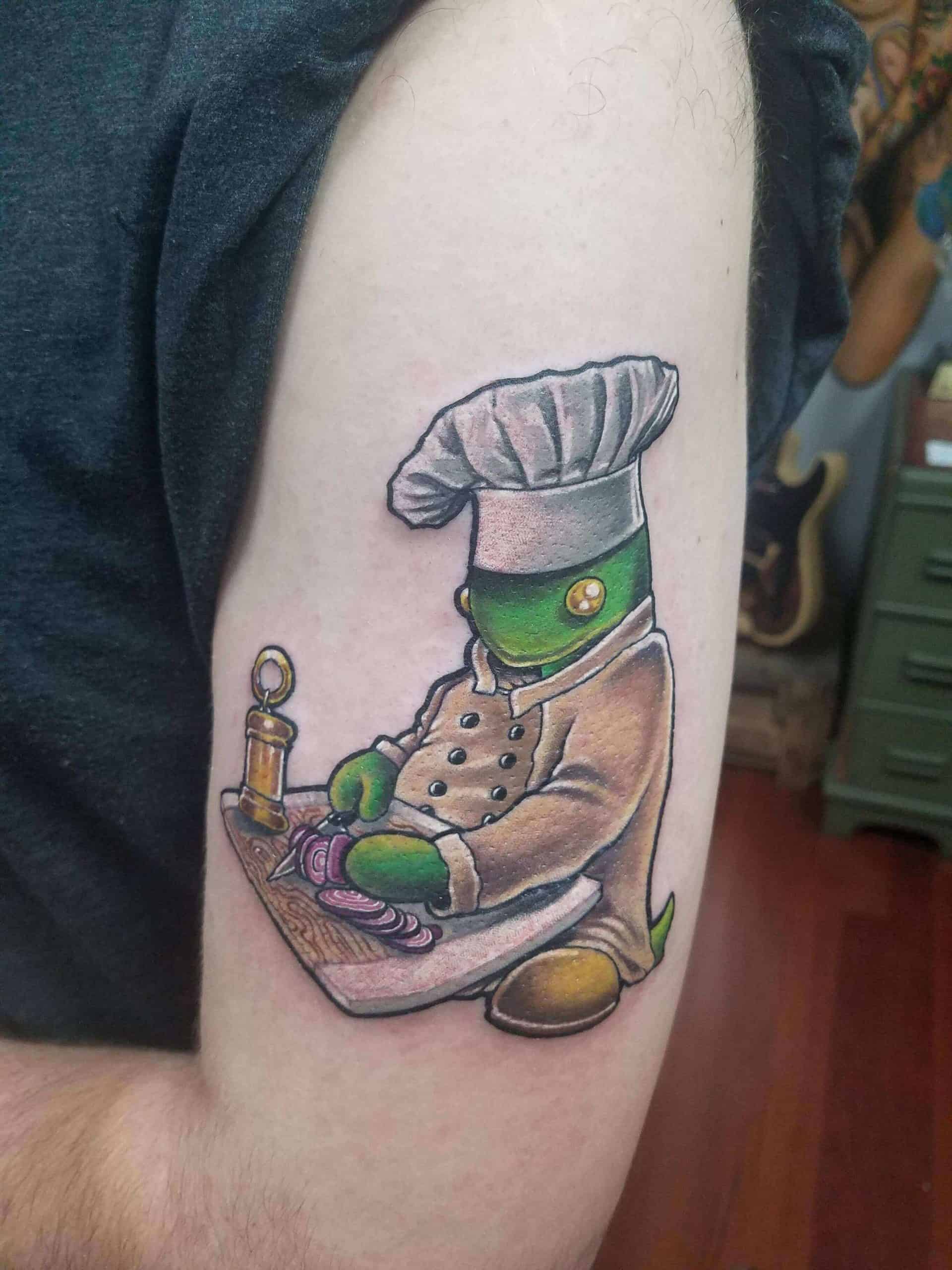 tonberry tattoo on arm