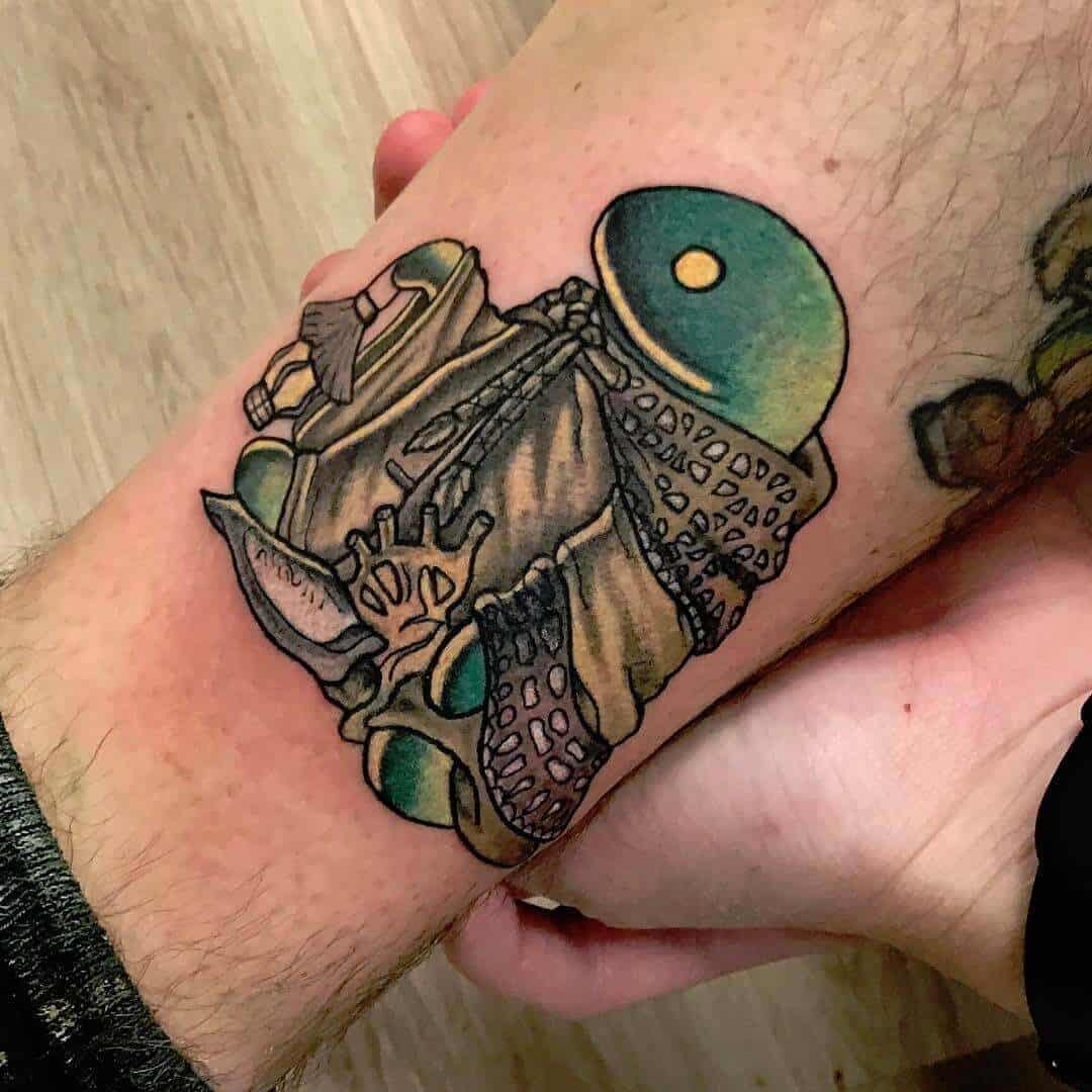 tonberry tattoo on leg