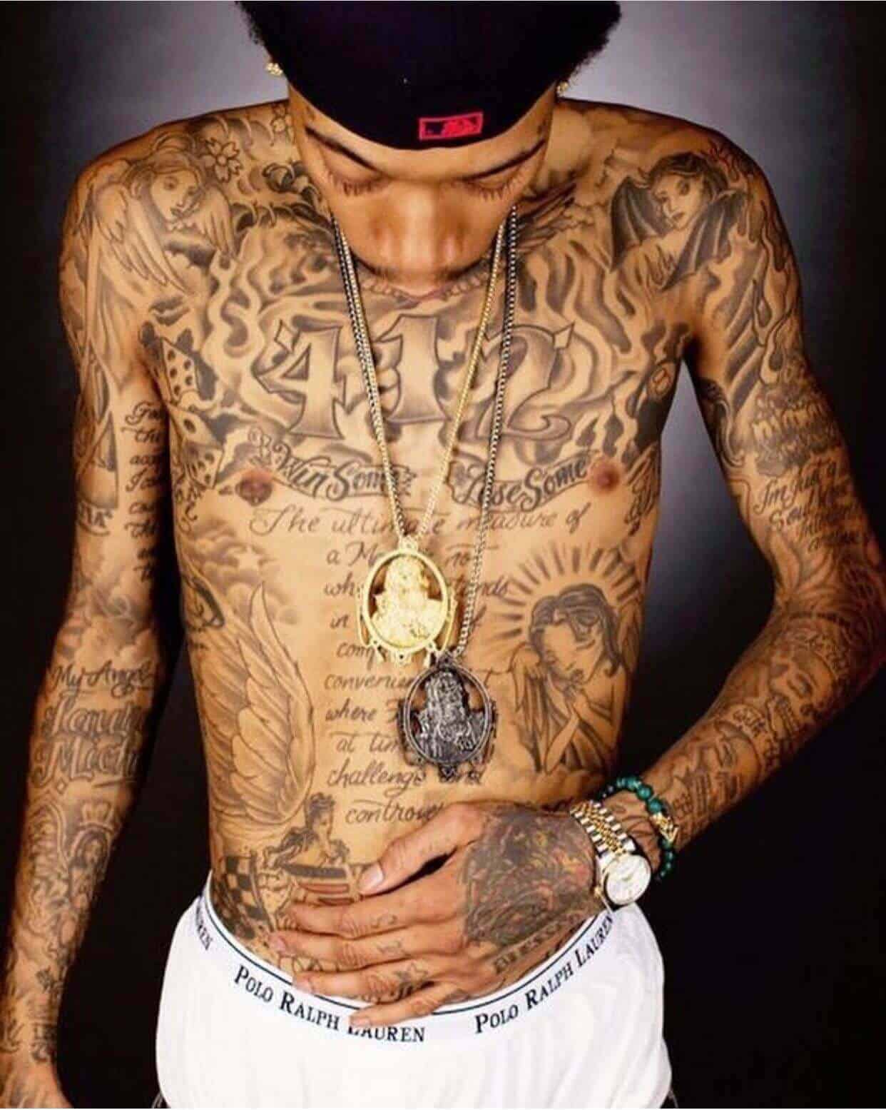 wiz khalifa arm tattoo.