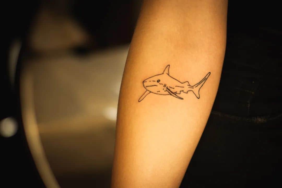 minimalist small shark tattoo